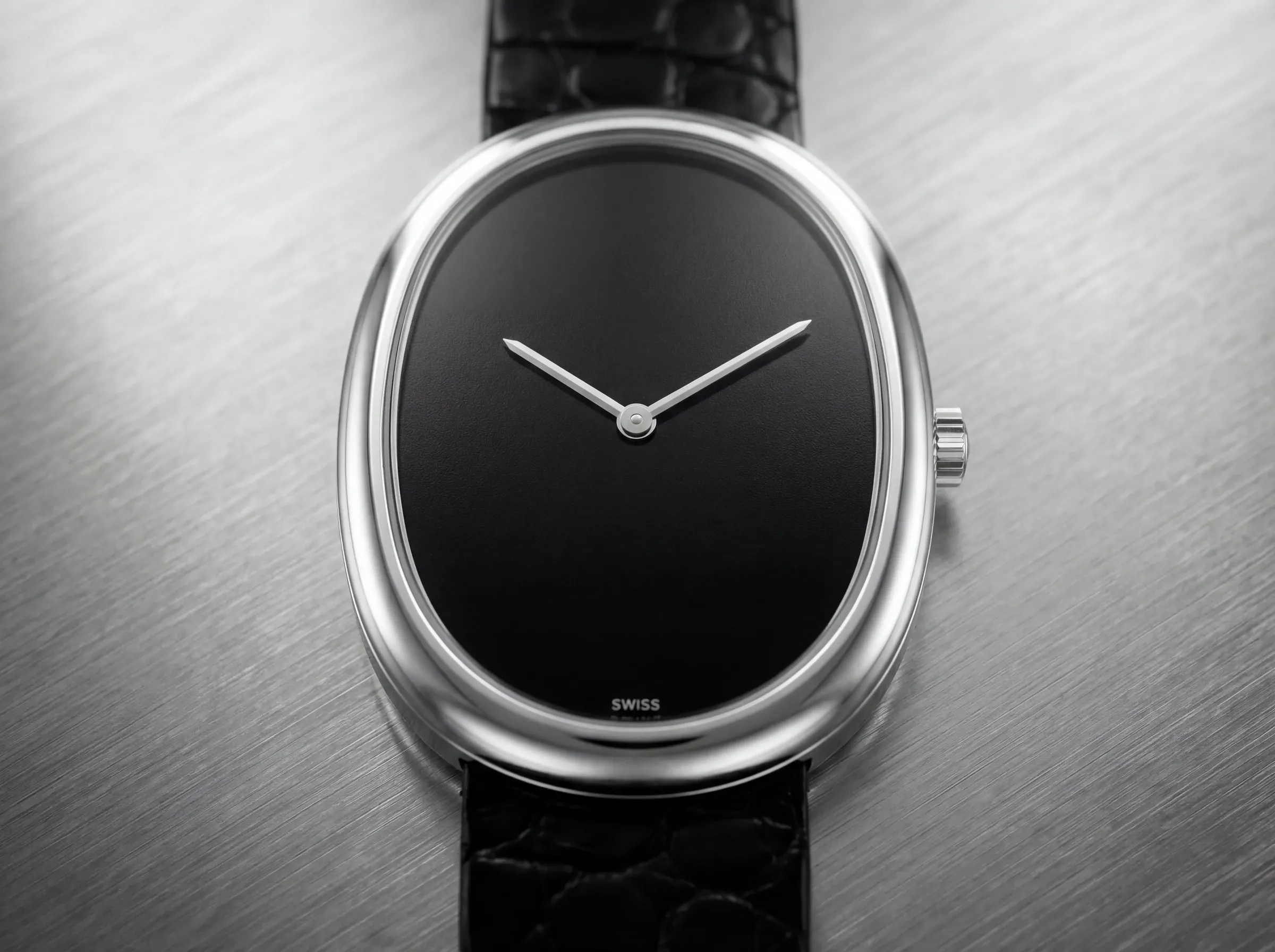 Watch dial shown face-on with controlled reflections